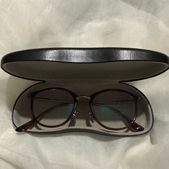 Ray-Ban RB7140
RoundTortoise BronzeEyeglasses - Picture 3 of 8